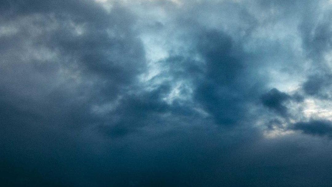 Heavy storm clouds over a dark sea